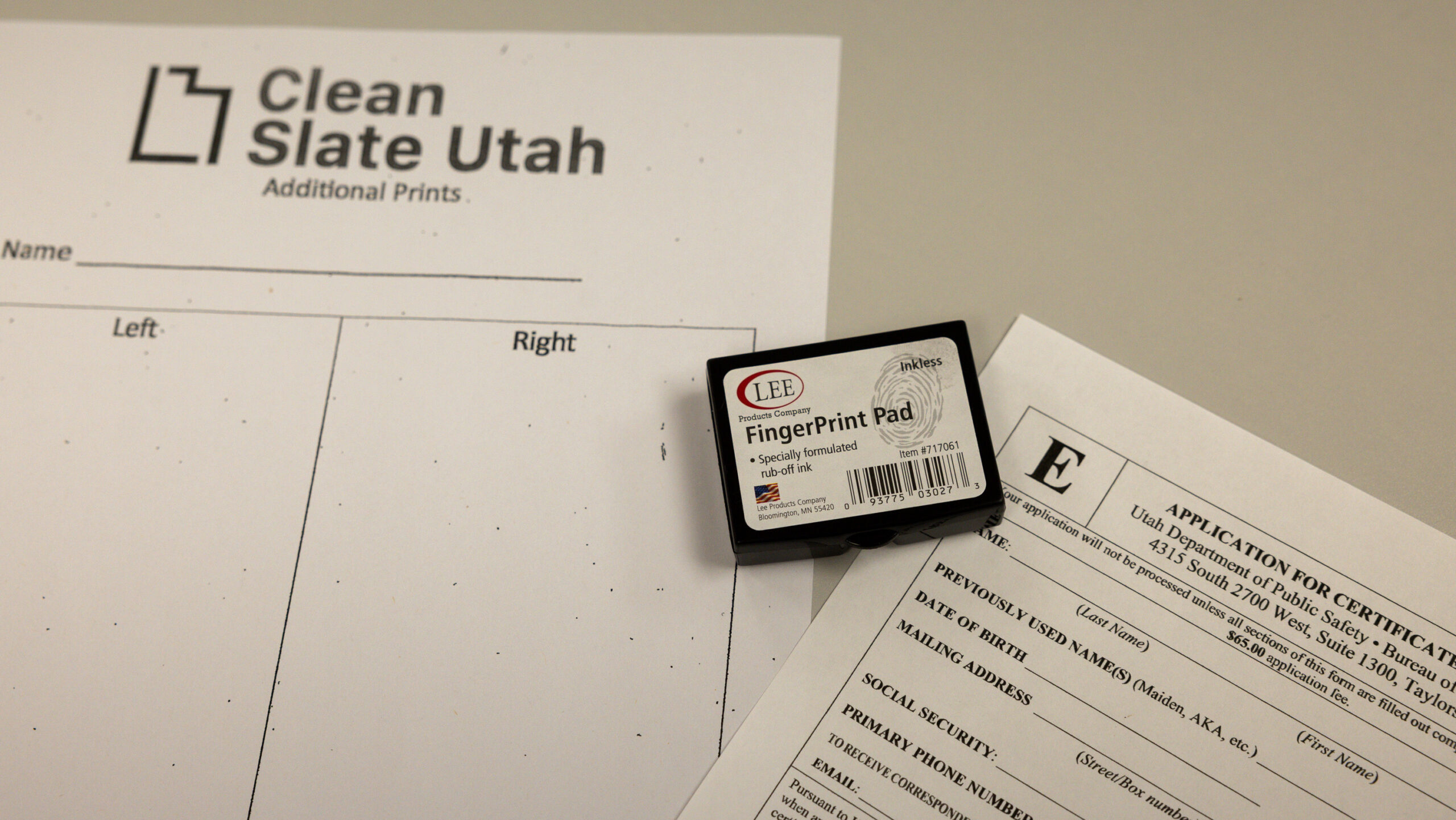 A FingerPrint Pad and paperwork from Clean Slate Utah is laid out at Utah Support Advocates for Rec...