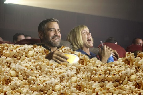 George-Clooney-Eating-Popcorn-at-Movies-64616