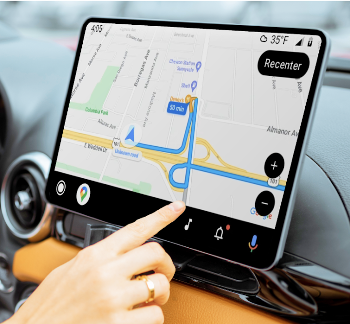 A person interacting with Google Maps on a car's infotainment touchscreen