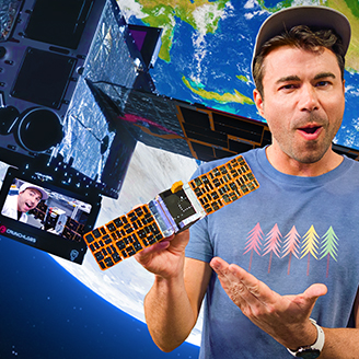 Mark Rober poses with a satellite with Earth in the background.