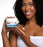 cocoa butter balm solid lotion in model's hand