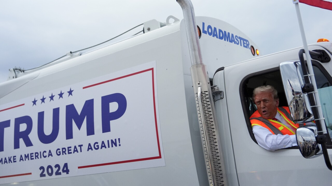 donald trump in a garbage truck