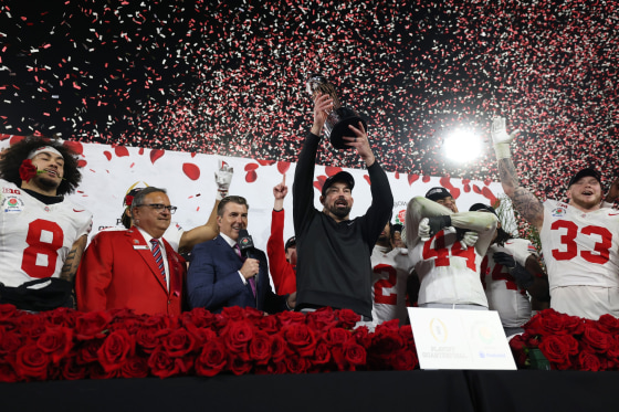 Image: Head coach Ryan Day of the Ohio State Buckeyes holds up the Leishman Trophy after defeating the Oregon Ducks 41-21 in the Rose Bowl game on Jan. 1, 2025, in Pasadena, Calif.