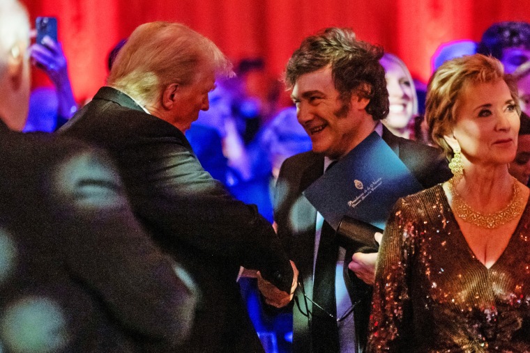 President-elect Donald Trump shakes hands with Argentine President Javier Milei at the America First Policy Institute gala at Mar-A-Lago in Palm Beach, Fla., on Nov. 14, 2024. 