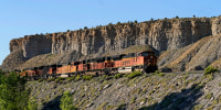 A train transports freight on a common carrier line near Price, Utah