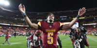 Image: Washington Commanders quarterback Jayden Daniels celebrates after beating the Atlanta Falcons 30-24 in overtime.