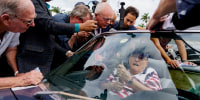 Rudy Giuliani speaks to members of the media outside a polling location in Palm Beach, Fla., on Nov. 5, 2024.