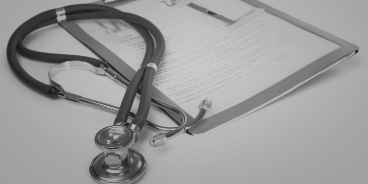 Stethoscope and a report isolated over white