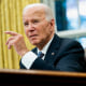 President Joe Biden speaks in the Oval Office on Sept. 30, 2024. 