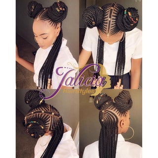 Fulani braids with space buns in the front and loose braids in the back
