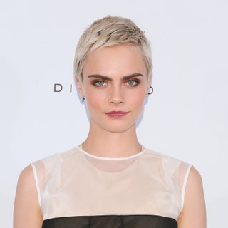 Cara Delevingne with a short razored pixie