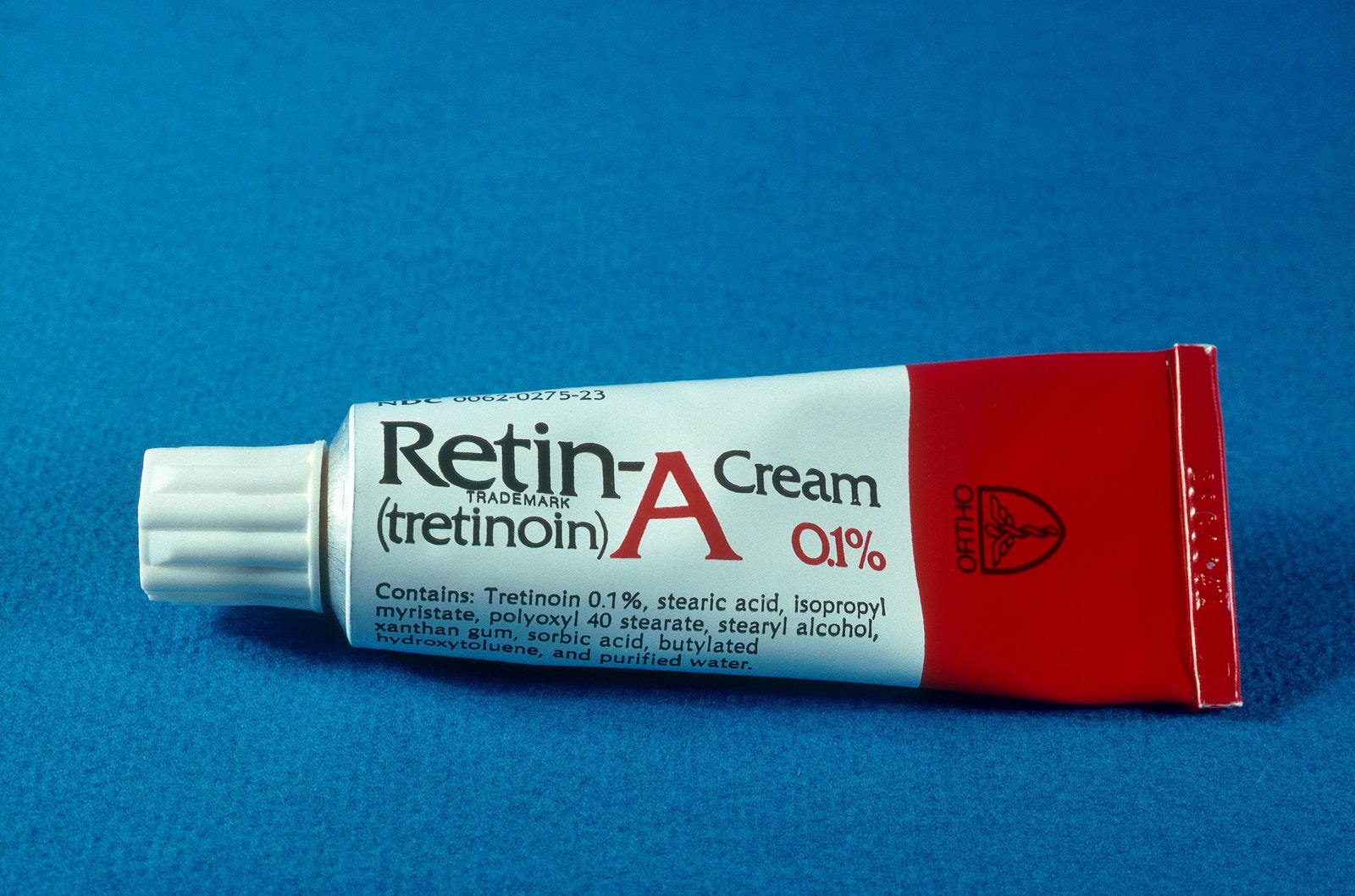 A closeup image of a tube of prescription acne medication RetinA