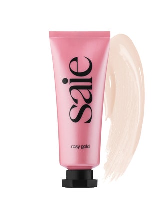 Saie Dew Balm Bouncy Marshmallow Highlighter pink tube of liquid highlighter with black cap and swatch on white background