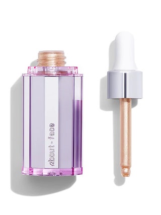 AboutFace Light Lock Highlight Fluid purple chrome dropper bottle of liquid highlighter on white background