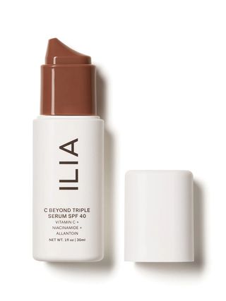 Ilia C Beyond Triple Serum SPF 40 white tube with brown pump cap with white cap on white background