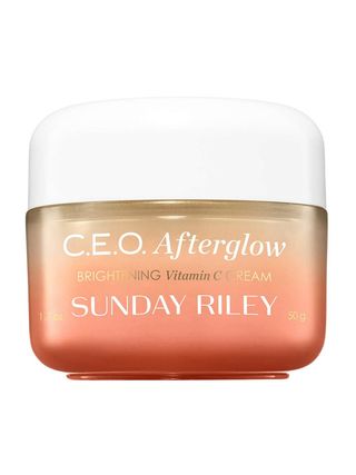 Sunday Riley CEO Afterglow Brightening Vitamin C Cream yellow to orange gradient jar with white lid on white background