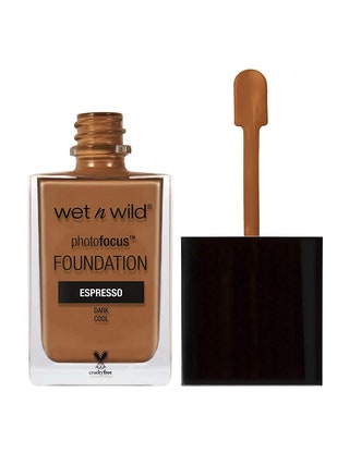 Wet n Wild Photo Focus Foundation transparent jar of foundation with black cap and wand on white background