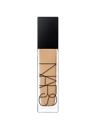 Nars Natural Radiant Longwear Foundation transparent bottle of foundation with black cap on white background