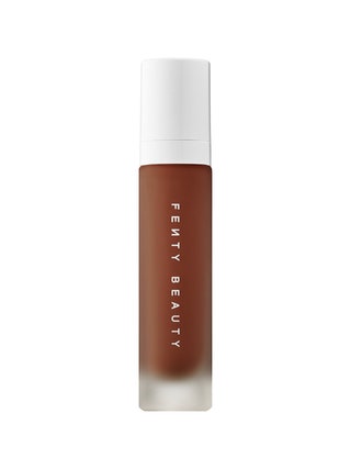 Fenty Beauty Pro Filtr Soft Matte Longwear Liquid Foundation translucent bottle of foundation with white cap on white...