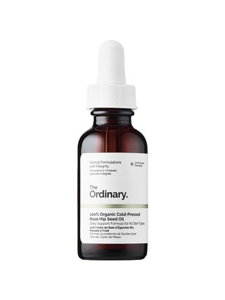 The Ordinary 100 Organic ColdPressed Rose Hip Seed Oil brown serum bottle with white label on white background