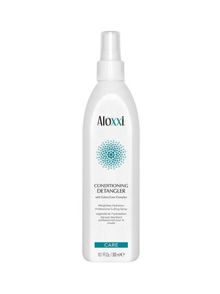 Aloxxi Leave In Conditioning Detangler white spray bottle on white background