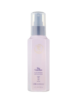 TPH by Taraji The Guardian Curl Refresher Mist lilac spray bottle on white background