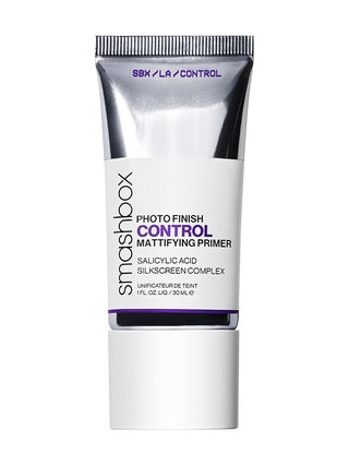 A silver tube of the Smashbox Photo Finish Control Mattifying Primer on a white background