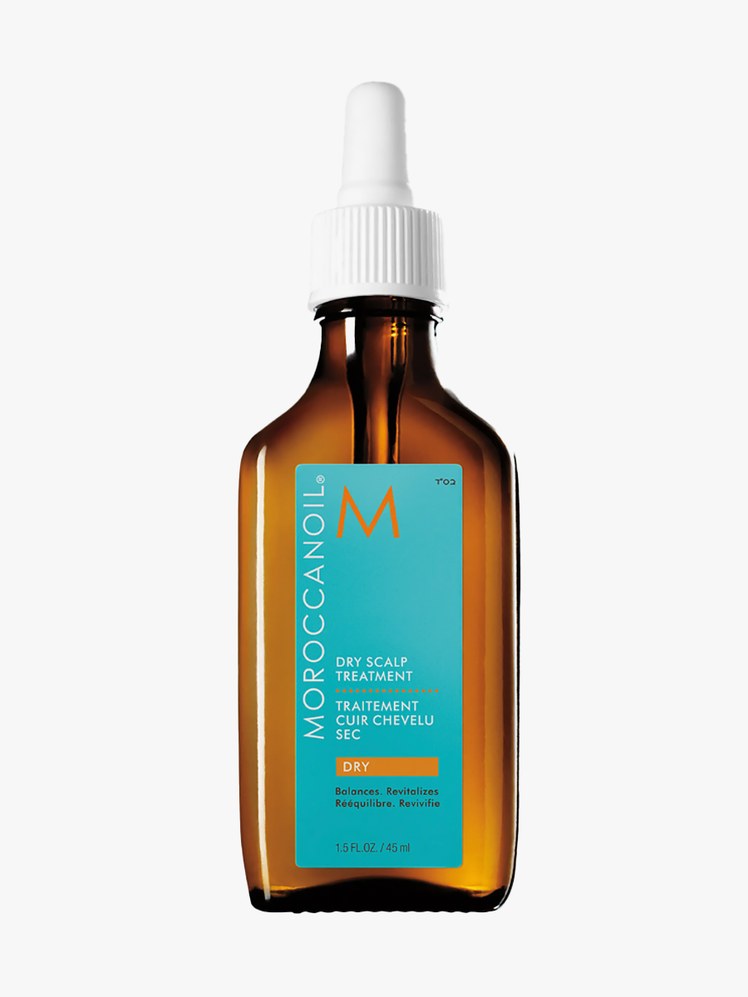 Moroccanoil Dry Scalp Treatment in branded amber bottle with white pipette cap on light gray background