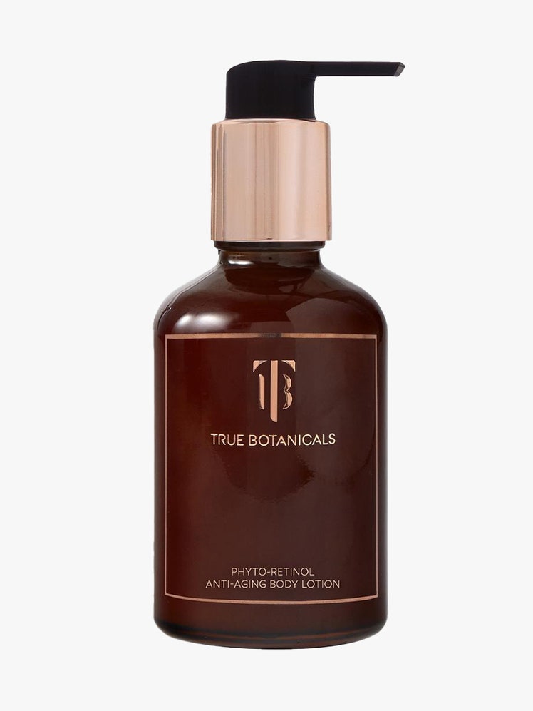 True Botanicals Phyto-Retinol Anti-Aging Body Lotion brown bottle with rose gold and black pump on light gray background