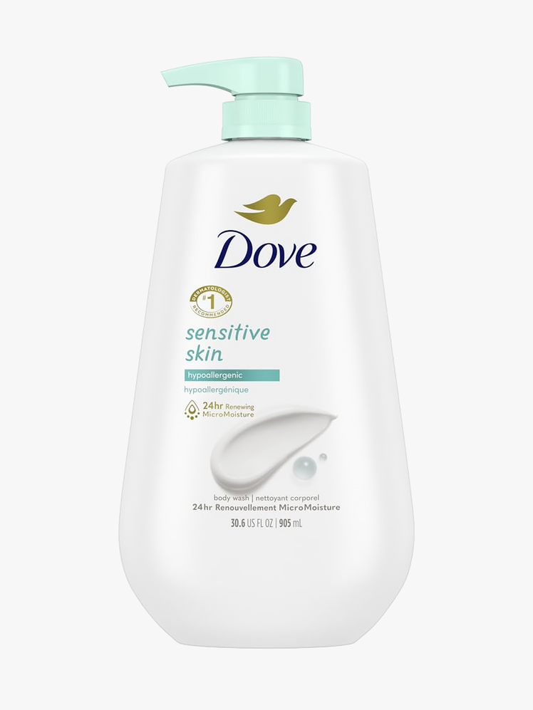 Dove Sensitive Skin Body Wash in branded white bottle with soft seafoam colored pump on light gray background