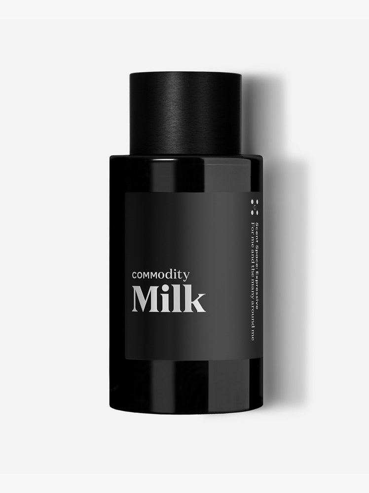 Commodity Milk Expressive Eau de Parfum: A black perfume bottle on a light gray background