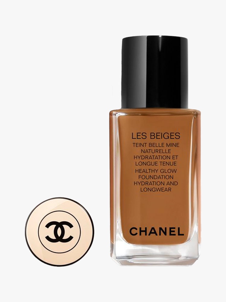 Chanel Les Beiges Healthy Glow Foundation clear rectangle bottle of foundation with black and gold cap on light gray background