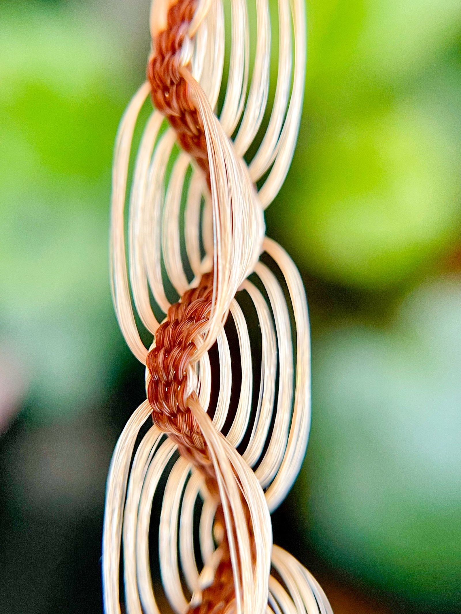 a close up of a hairwork spiral braid by zen hansen of hair anthropology