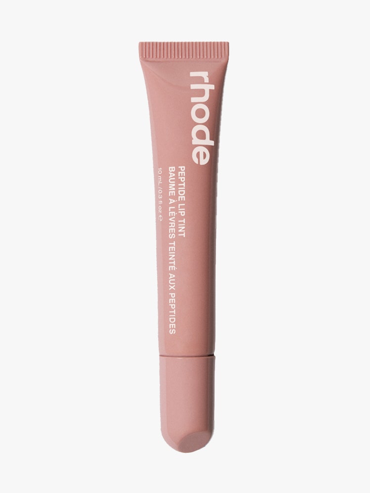 Rhode Peptide Lip Tint in Toast nude tube of lip gloss on light gray background