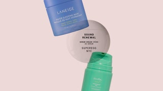 3 cosmetic items overlapping on a pink background. From left to right blue jar white disc and green pump bottle.