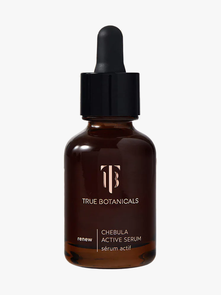 True Botanicals Chebula Active Serum in branded amber bottle with black pipette on light gray background
