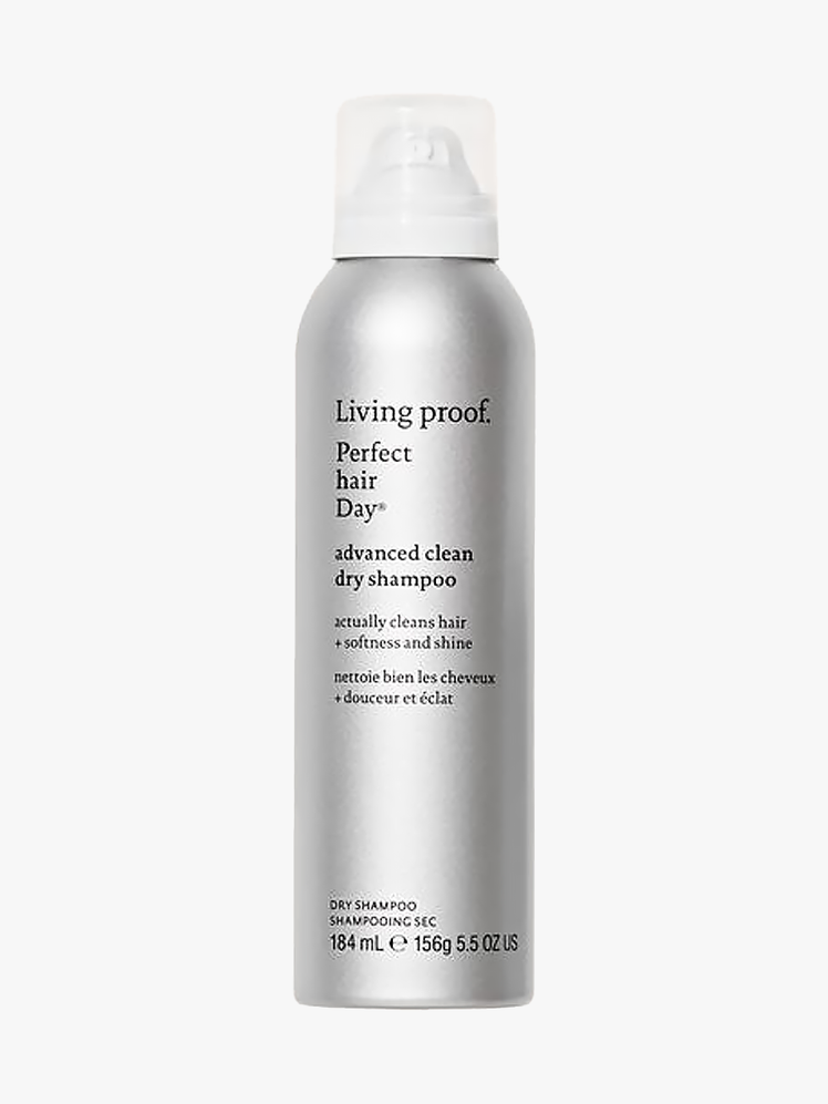 Living Proof Perfect Hair Day Advanced Clean Dry Shampoo in silver aerosol bottle with white pump on light gray background