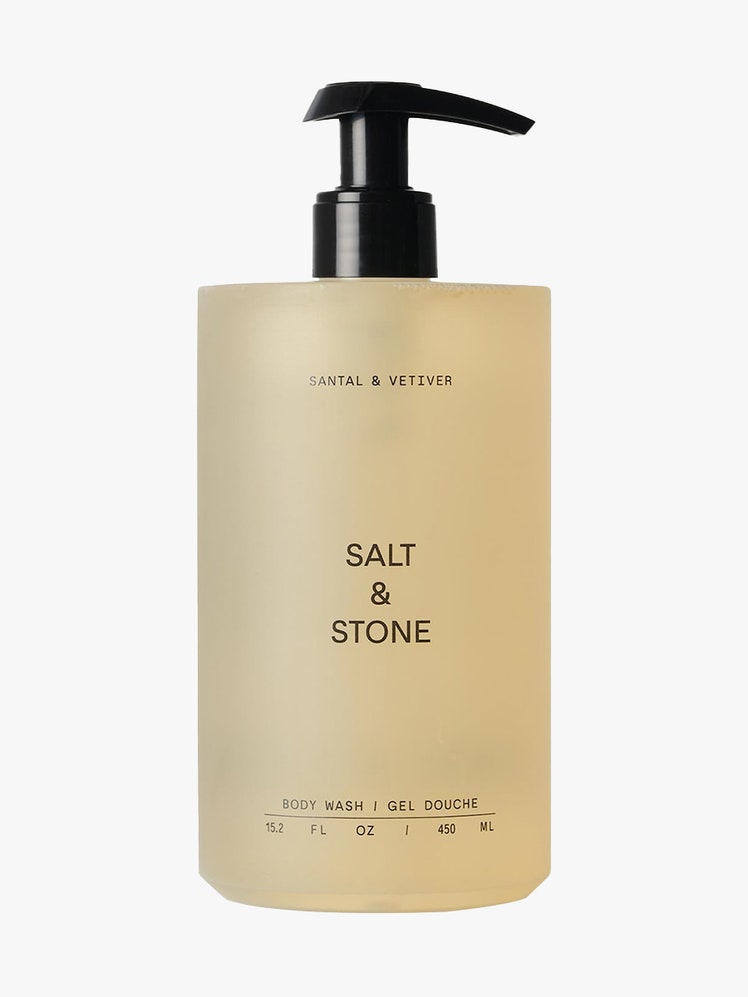 Salt & Stone Body Wash bottle of tan body wash with black pump cap on light gray background