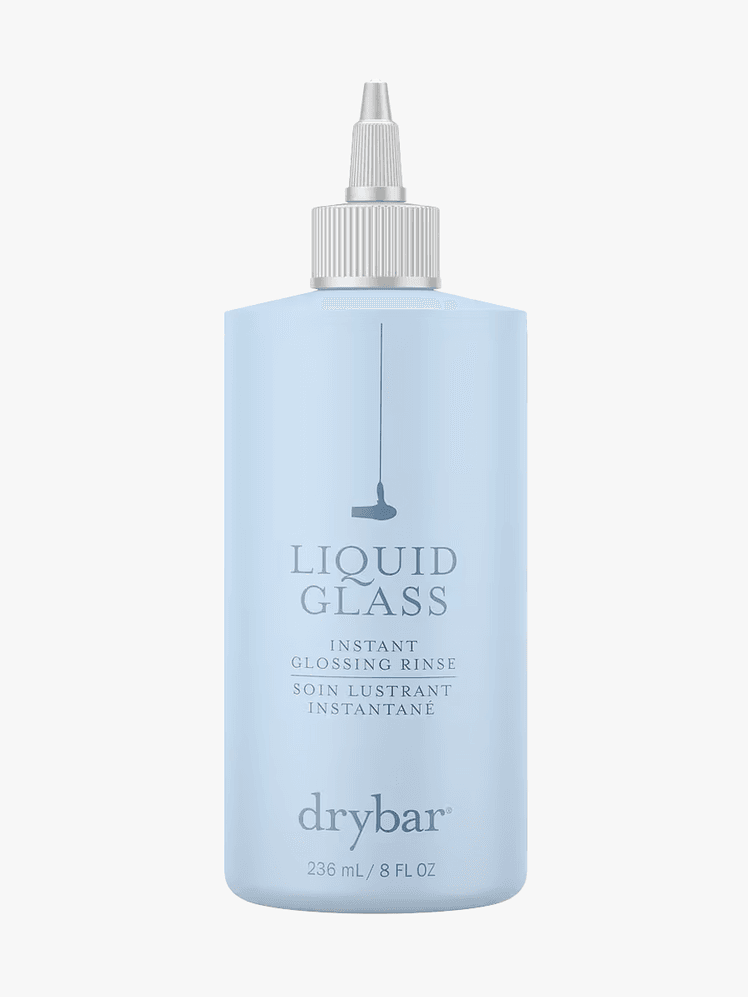 Drybar Liquid Glass Instant Glossing Rinse in light blue branded bottle with light gray applicator cap on light gray background