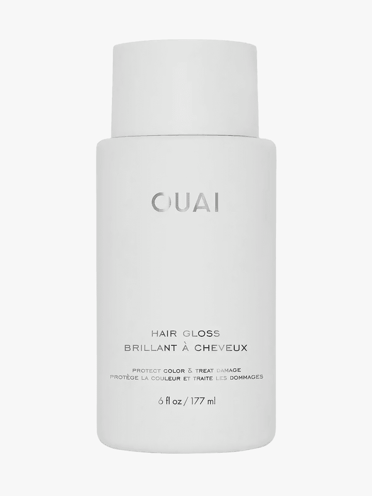 Ouai Hair Gloss in branded light gray bottle with cap on light gray background