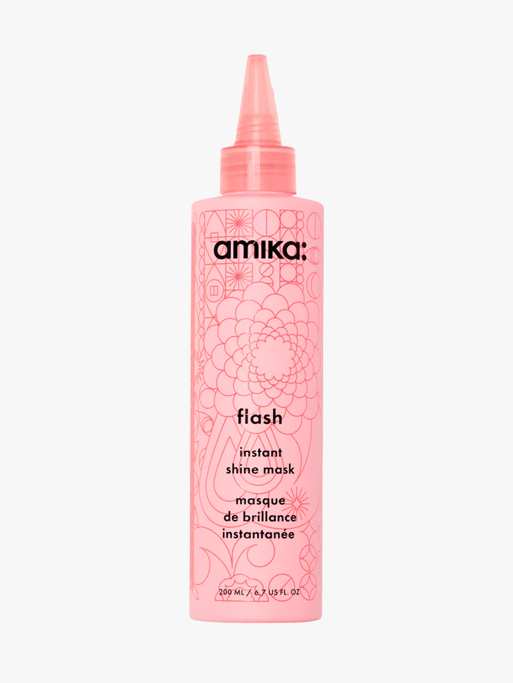 Amika Flash Instant Shine Hair Gloss Mask in branded pink bottle with applicator cap on light gray background