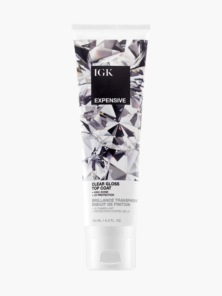 IGK Expensive Clear Gloss Top Coat in branded patterned white tube with cap on light gray background