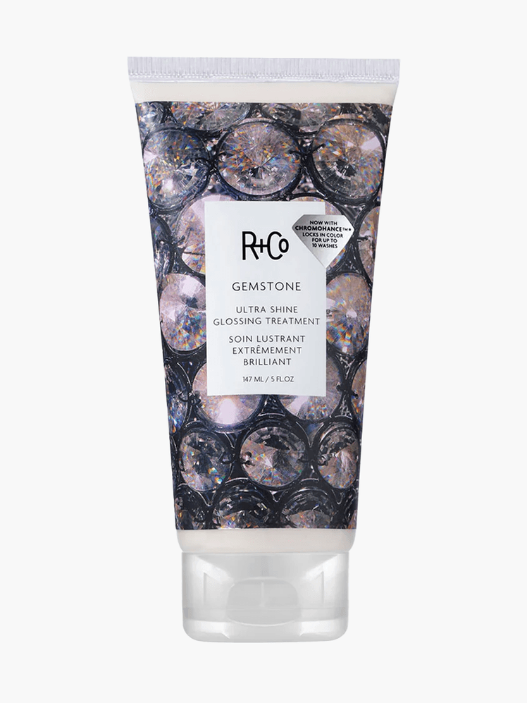 R+Co Ultra Shine Glossing Treatment in branded clear tube with cap on light gray background