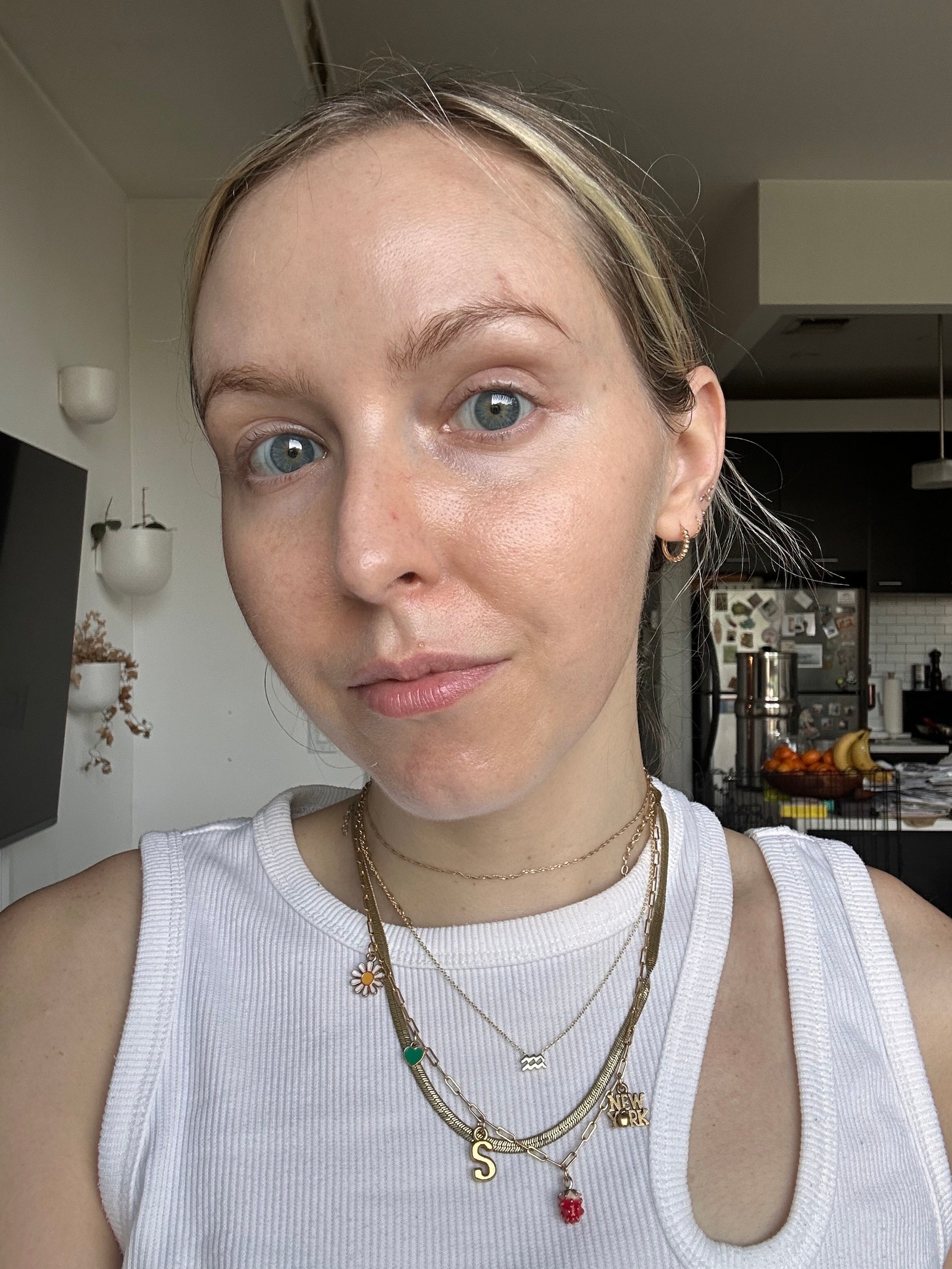 A selfie of Allure associate beauty director Sarah Kinonen with no foundation on