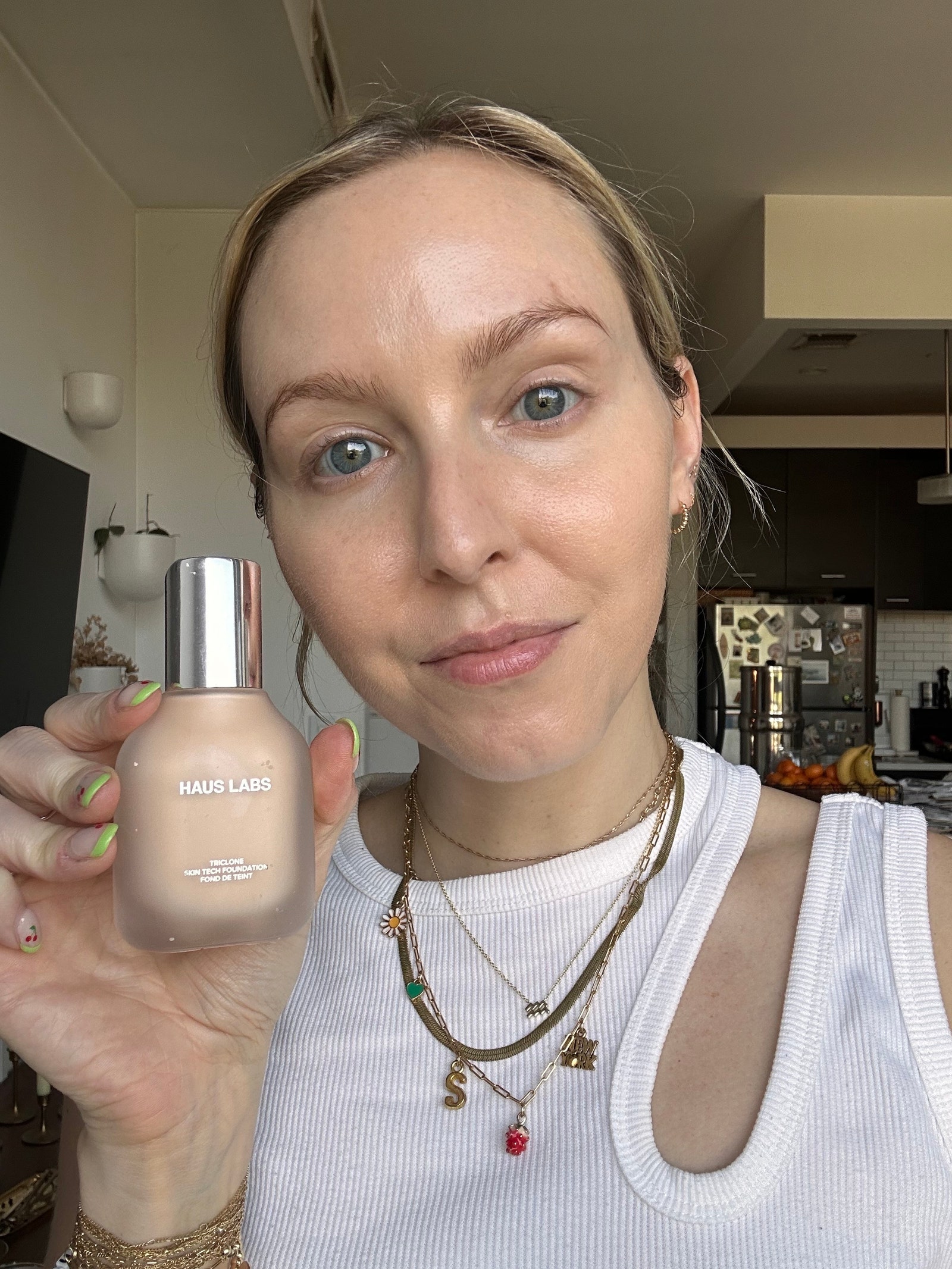 A selfie of Allure associate beauty director Sarah Kinonen after applying Haus Labs Triclone Skin Tech Foundation in...