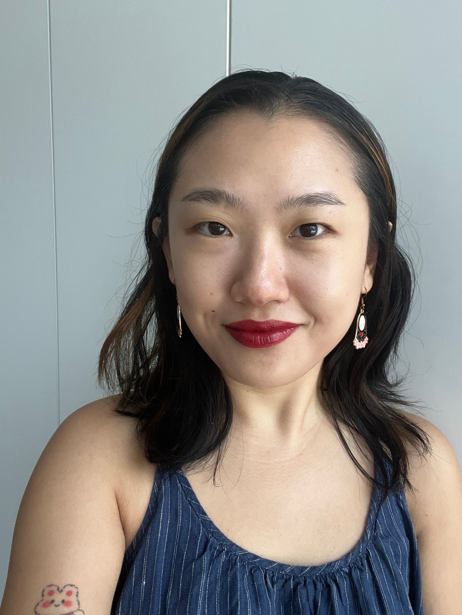 A selfie of Allure commerce editor Sarah Han without any base makeup