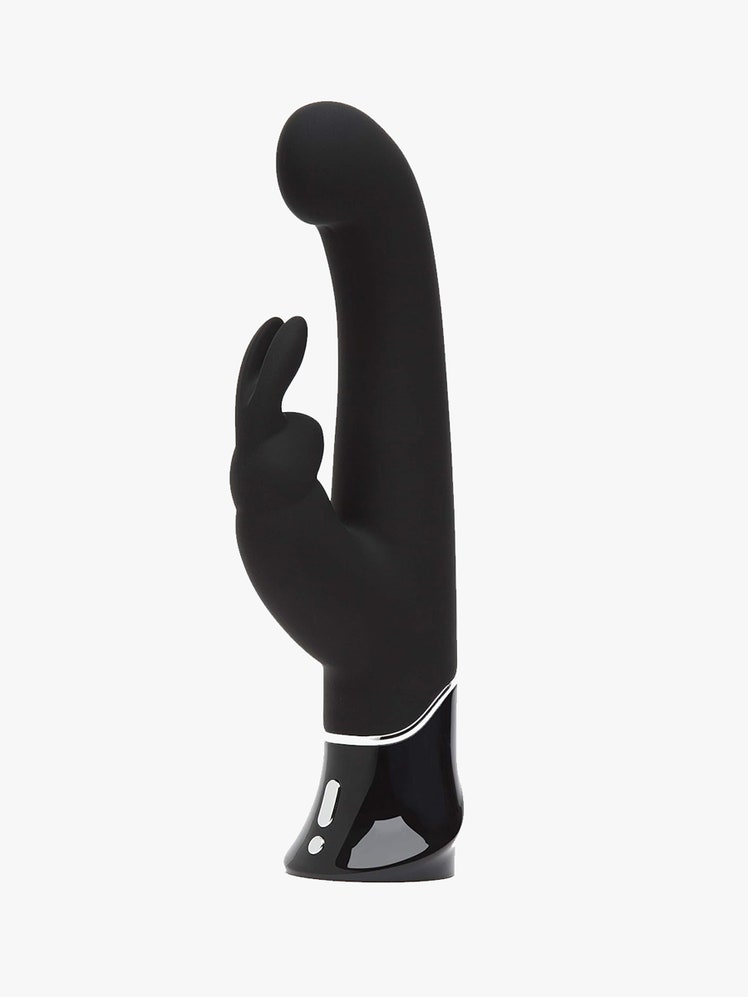 The Fifty Shades of Grey Greedy Girl G-Spot Rabbit Vibrator on a light gray background