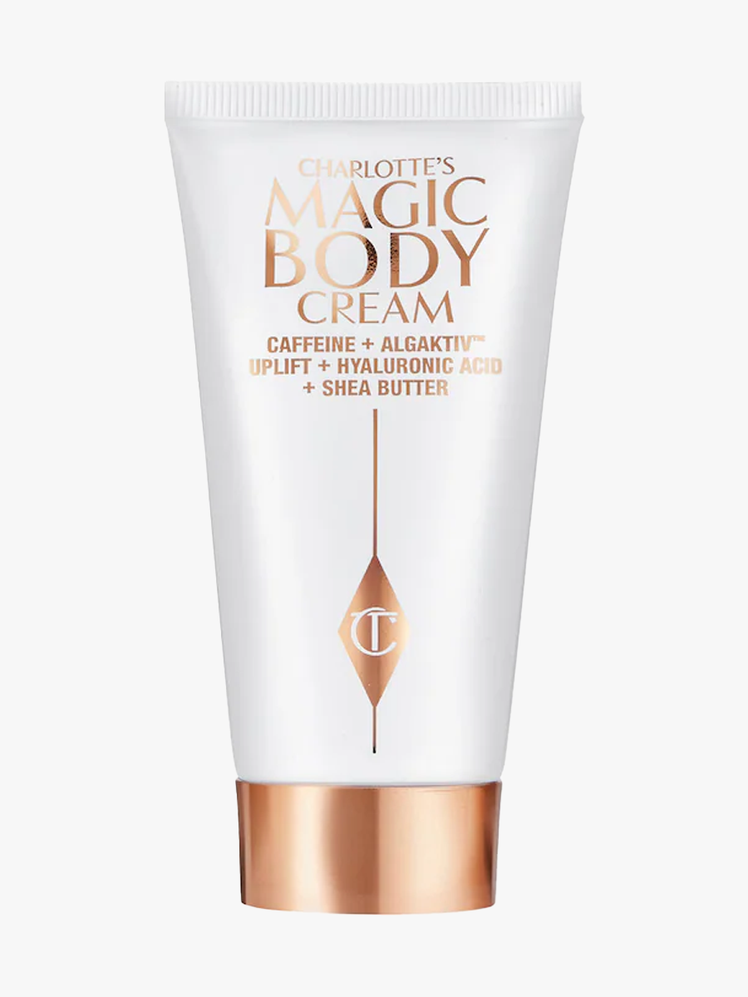 Charlotte Tilbury Magic Body Cream in branded tube component on a light gray background