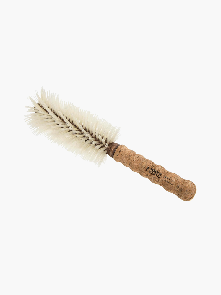 Series Round Brush in branded brown and beige color way on light gray background