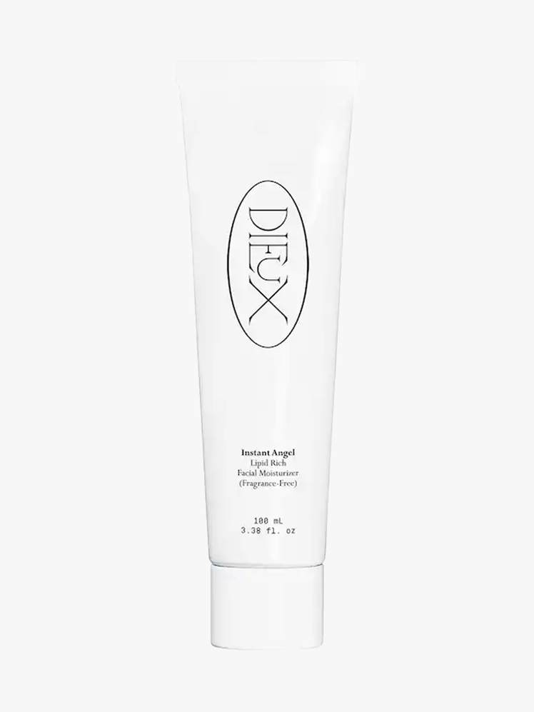 Dieux Instant Angel Moisturizer in branded tube component on a light gray background